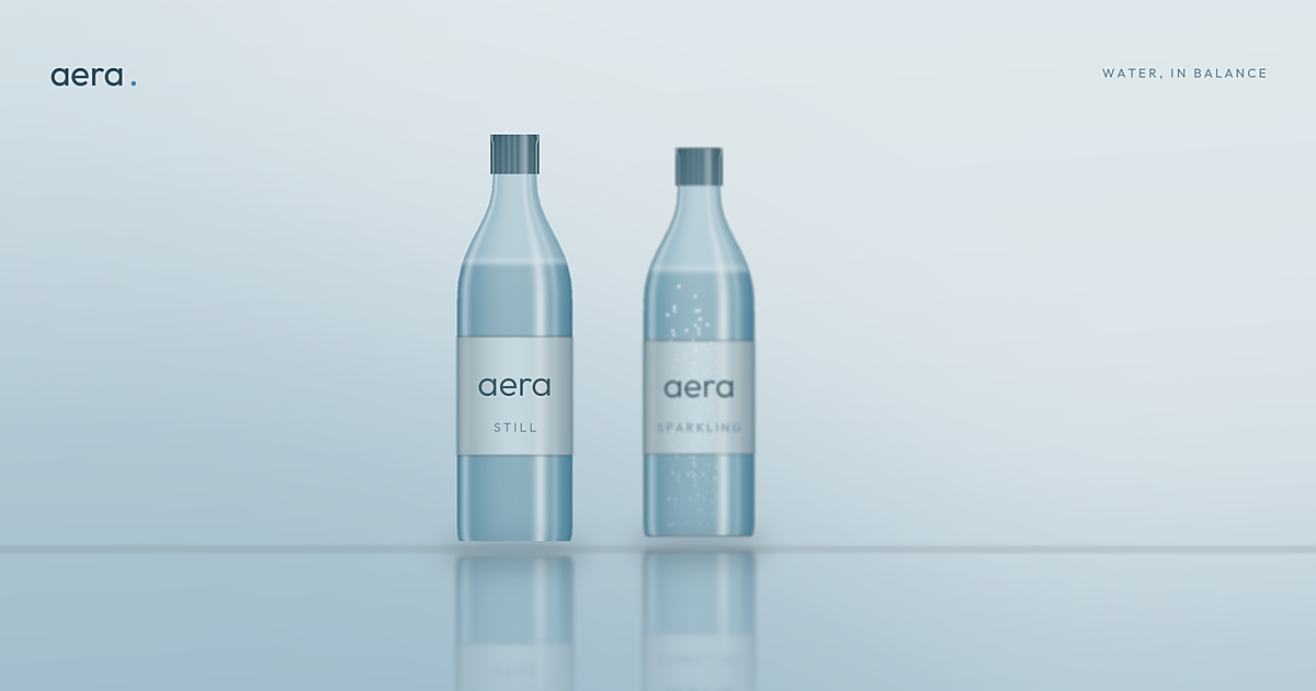Two aera bottles, still and sparkling, on a mirrored surface in soft daylight.